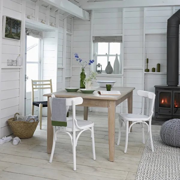 White bentwood chair with woven seat